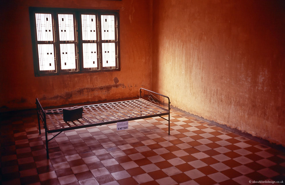 #7 Interrogation room at S-21. These are the only windows that are glassed, as a matter to mute the screams to the streets below. Torture methods were as creative as the interior design is not.