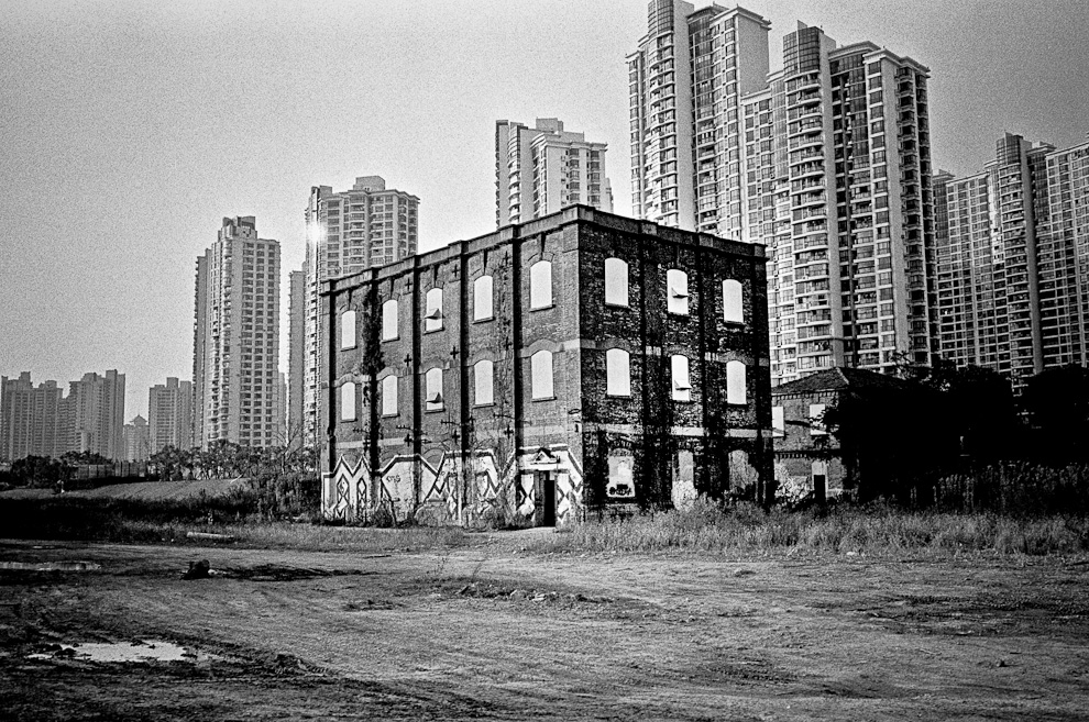 #7 This is an old housing complex in the middle of Shanghais highrise sprawl. This building will be gone by the time you read this.