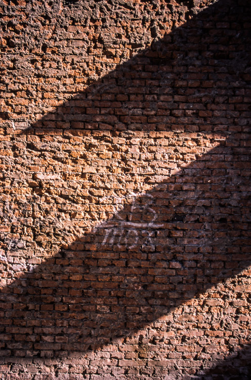 #10 artsy photo of a wall with shadow.