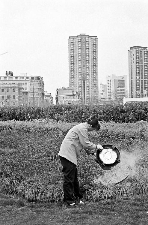 #22 emptying rice cooker in public park