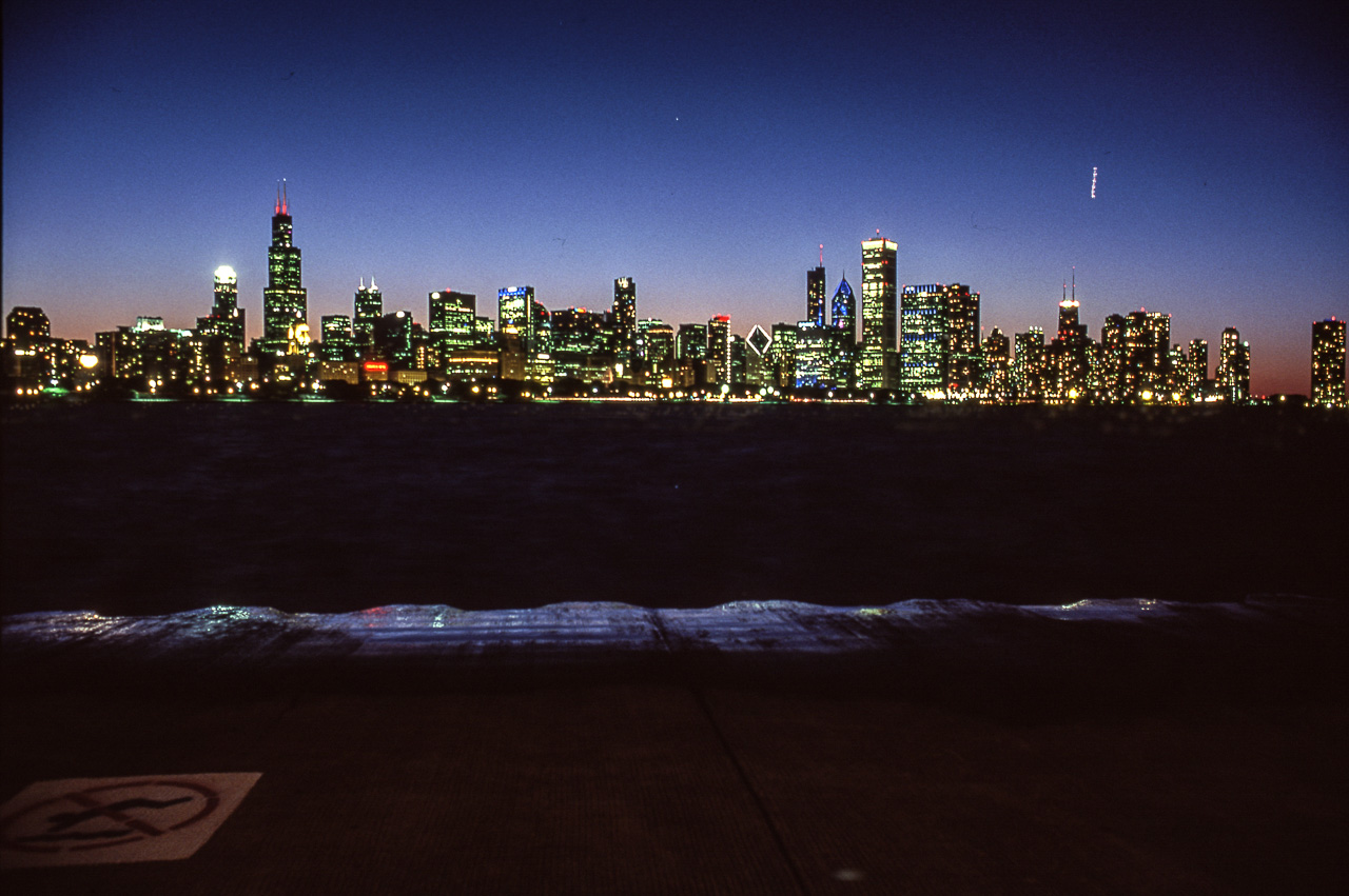 #11 Skyline, out of focus, at night.