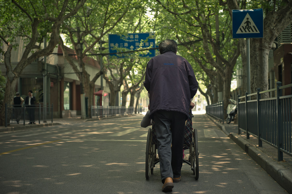 #10 wheelchair pushing on Maoming Lu
