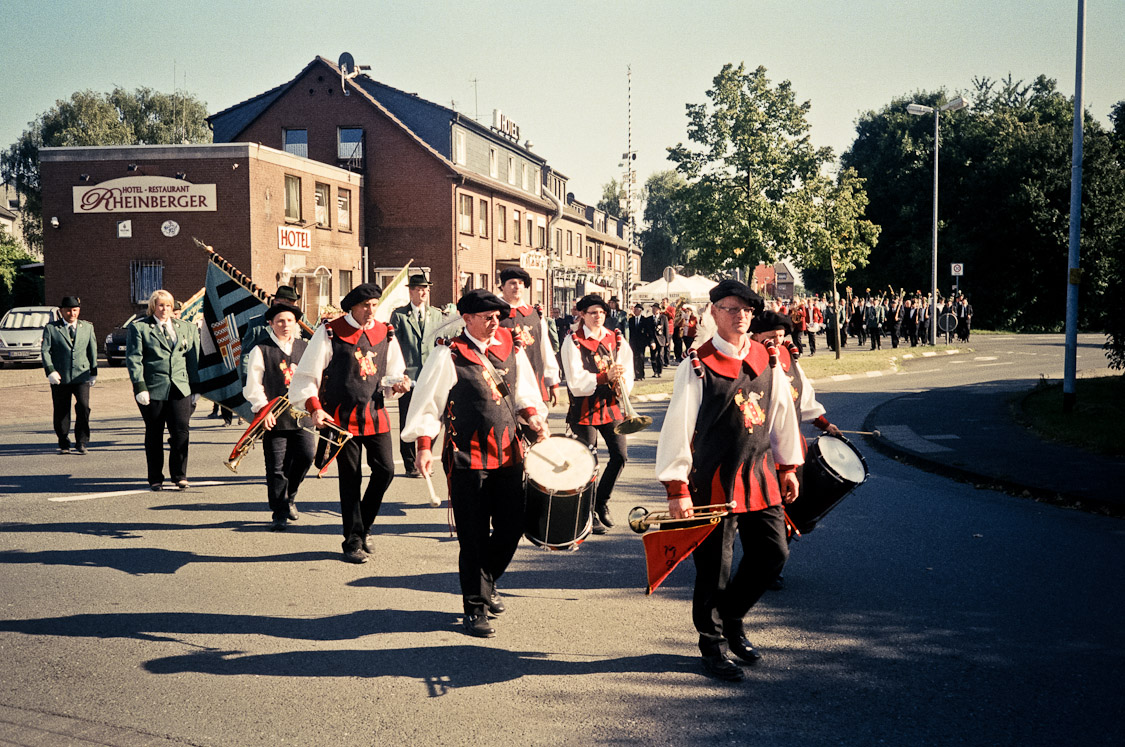 #13 then they're off for a march around the village.