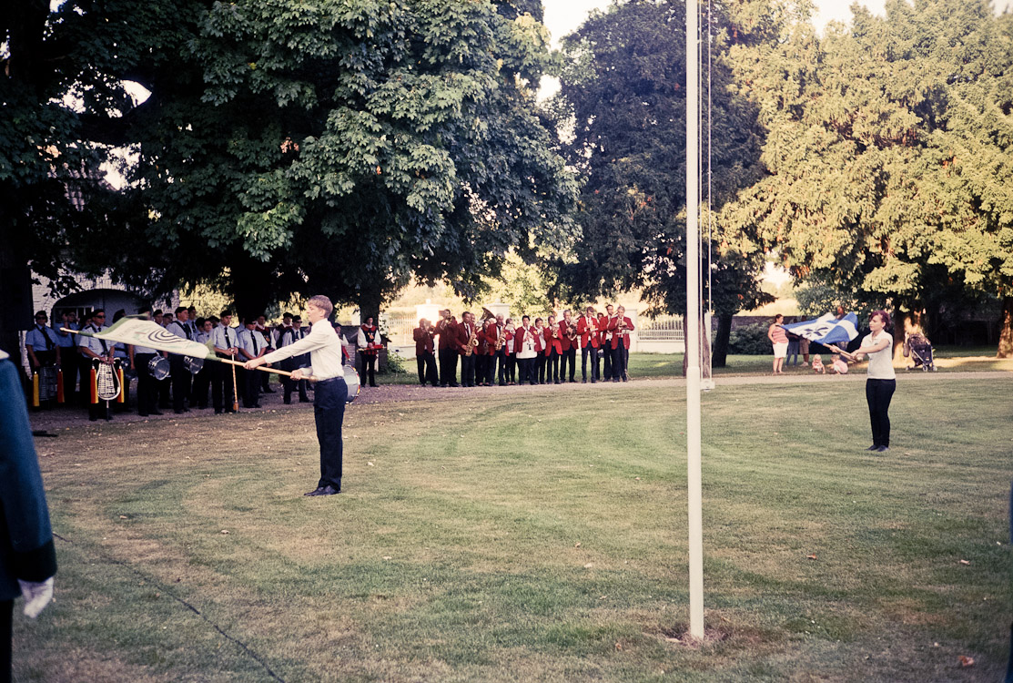 #11 and kids throwing flags around.