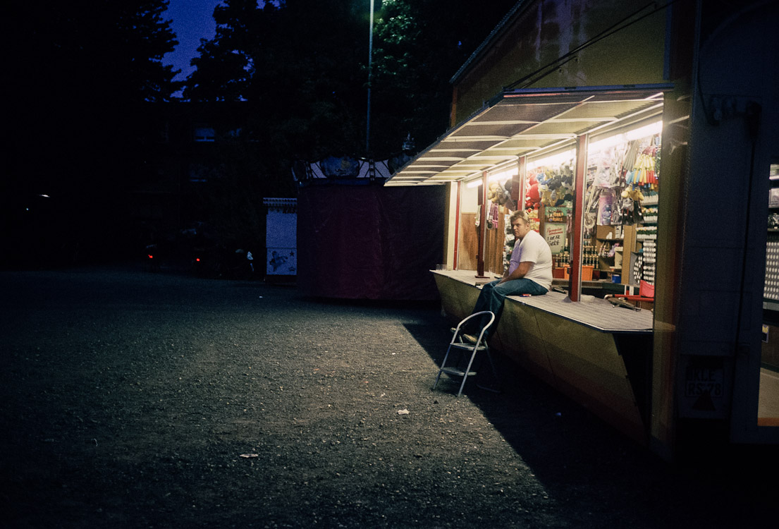 #21 meanwhile, outside, the dude with the air rifle stand isn't exacly busy.