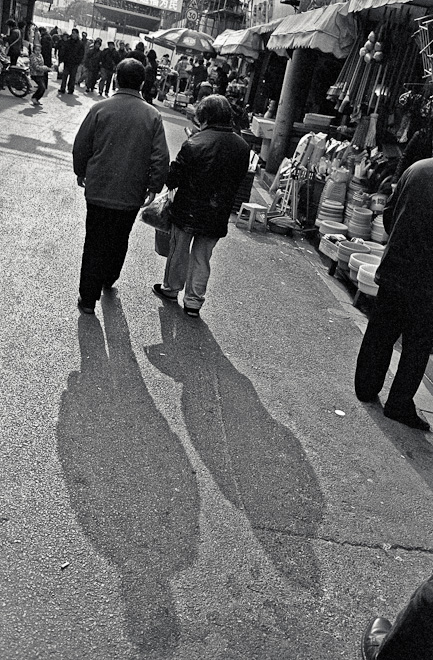 #12 I kept taking pictures of people's shadows. Just because the sun was out and I was amazed it still existed. Shadows, man.