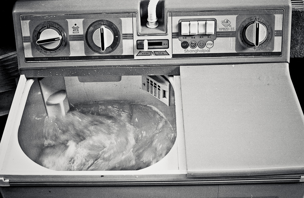 #17 Shanghaipai. Washing clothes on the street.