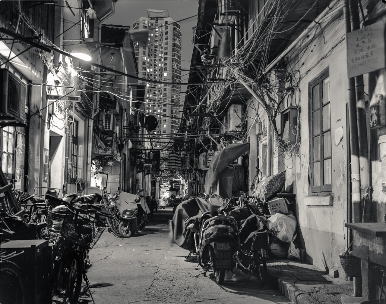 #44 Of course we did night walks. What's not to love about them? Here's a shot of a rather large alley in Xiaonanmen, with the obvious highrise apartment building in the background.