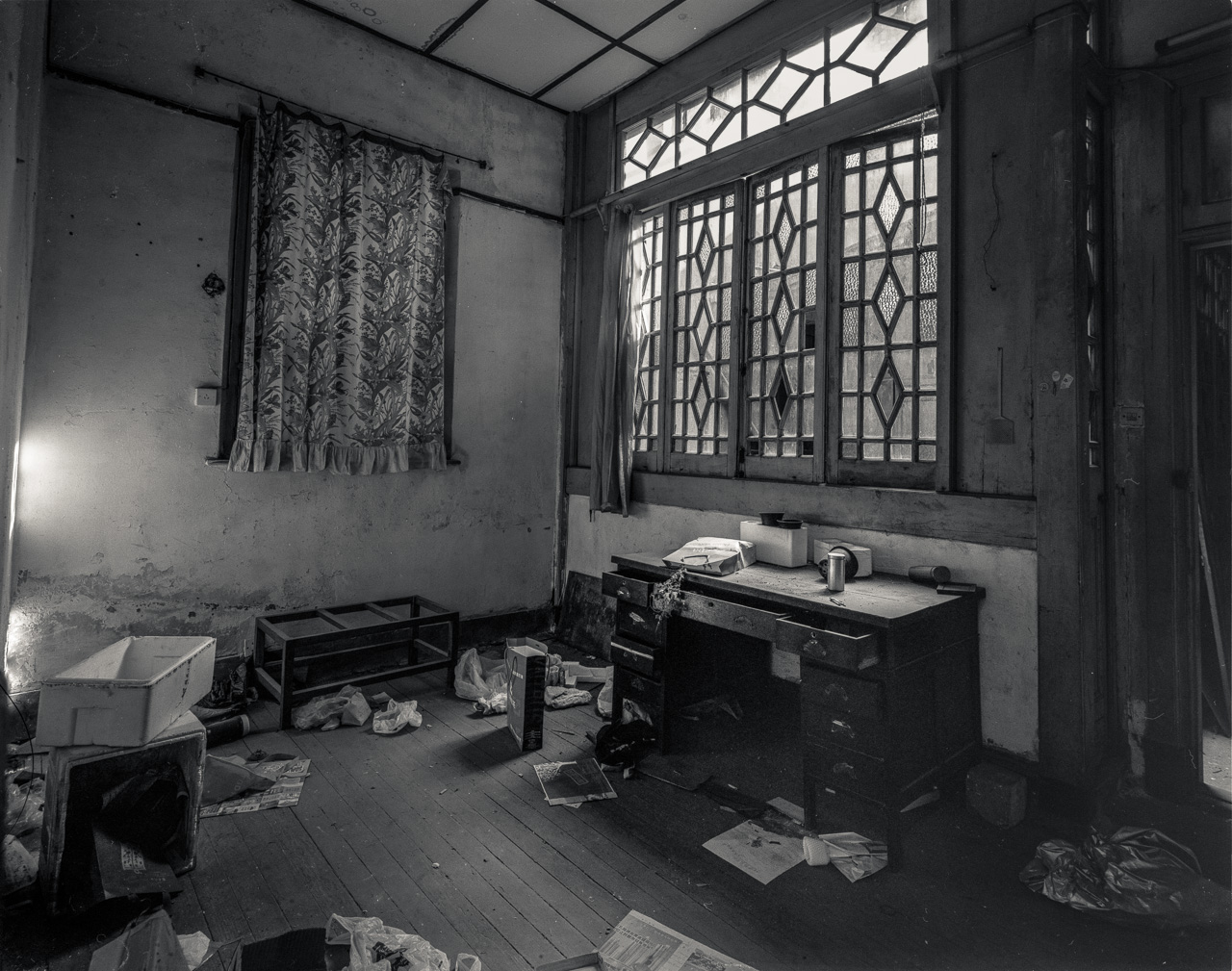 #68 Some buildings are surprisingly intact - although completely locked up and inaccessible. This one had an open window where the Bertha just fit through.