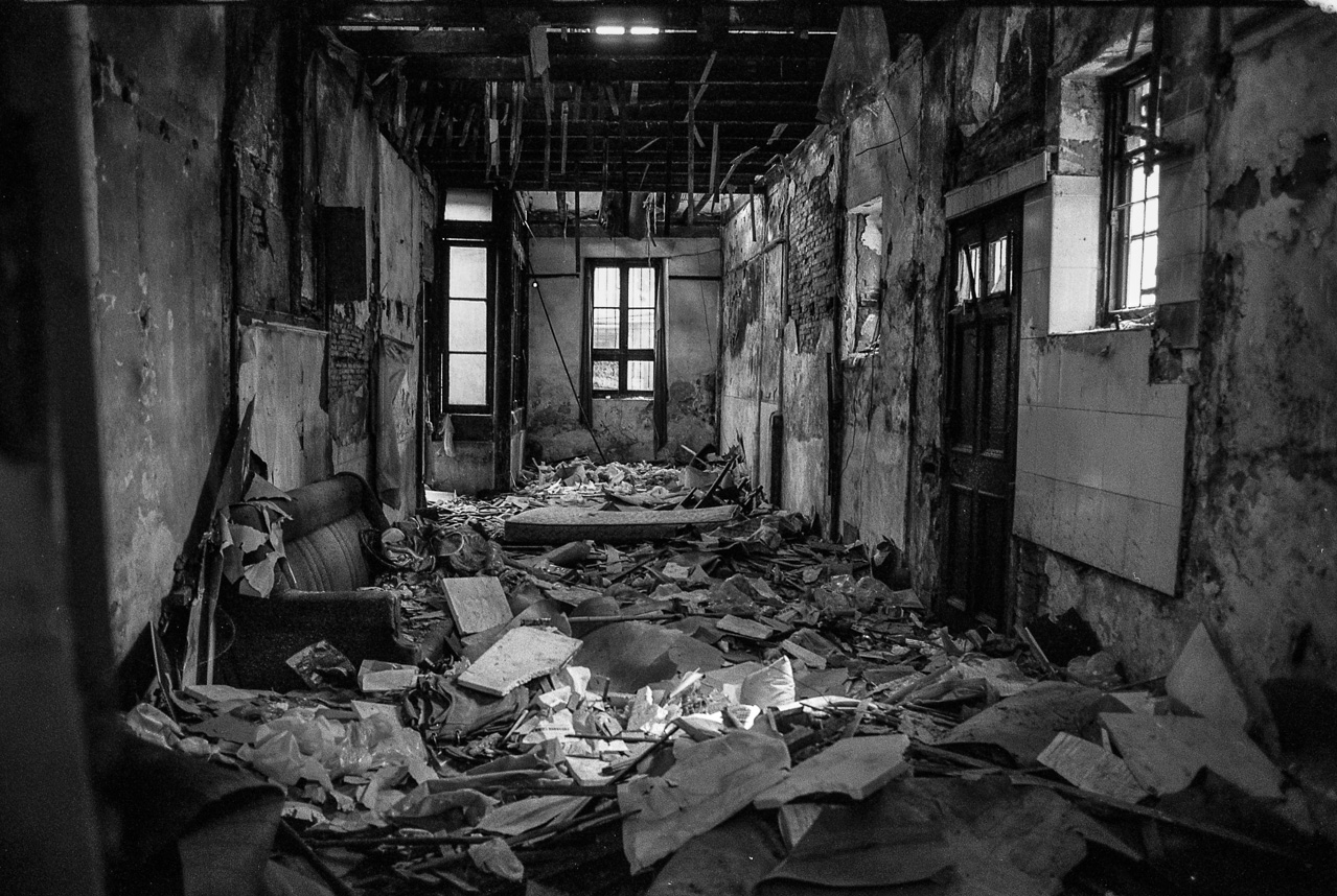 #54 Rubble, rubble, rubble, with sofas still there, matresses, and basically everything that was on the top floor lying around on the ground floor.