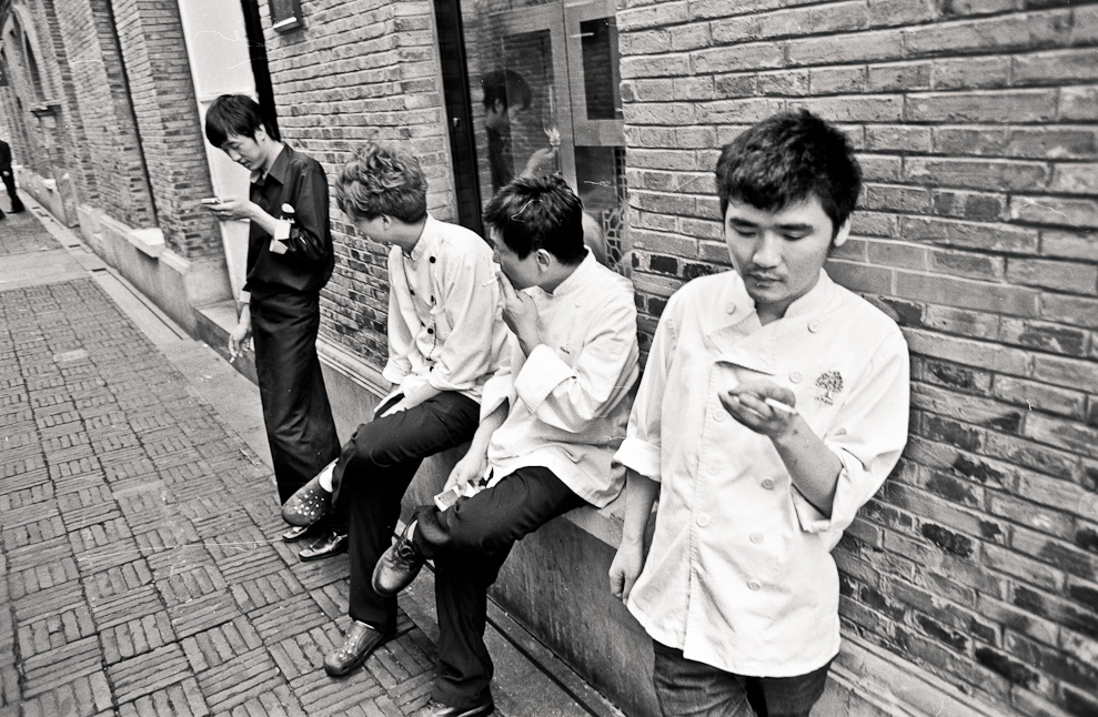 #16 smoking lads in Xintiandi.