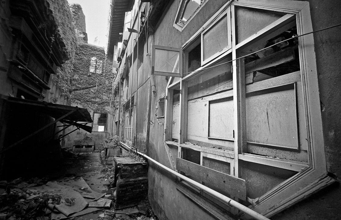 #14 behind a closed door, theres a little backyard thats being reclaimed by nature. Well eerie.