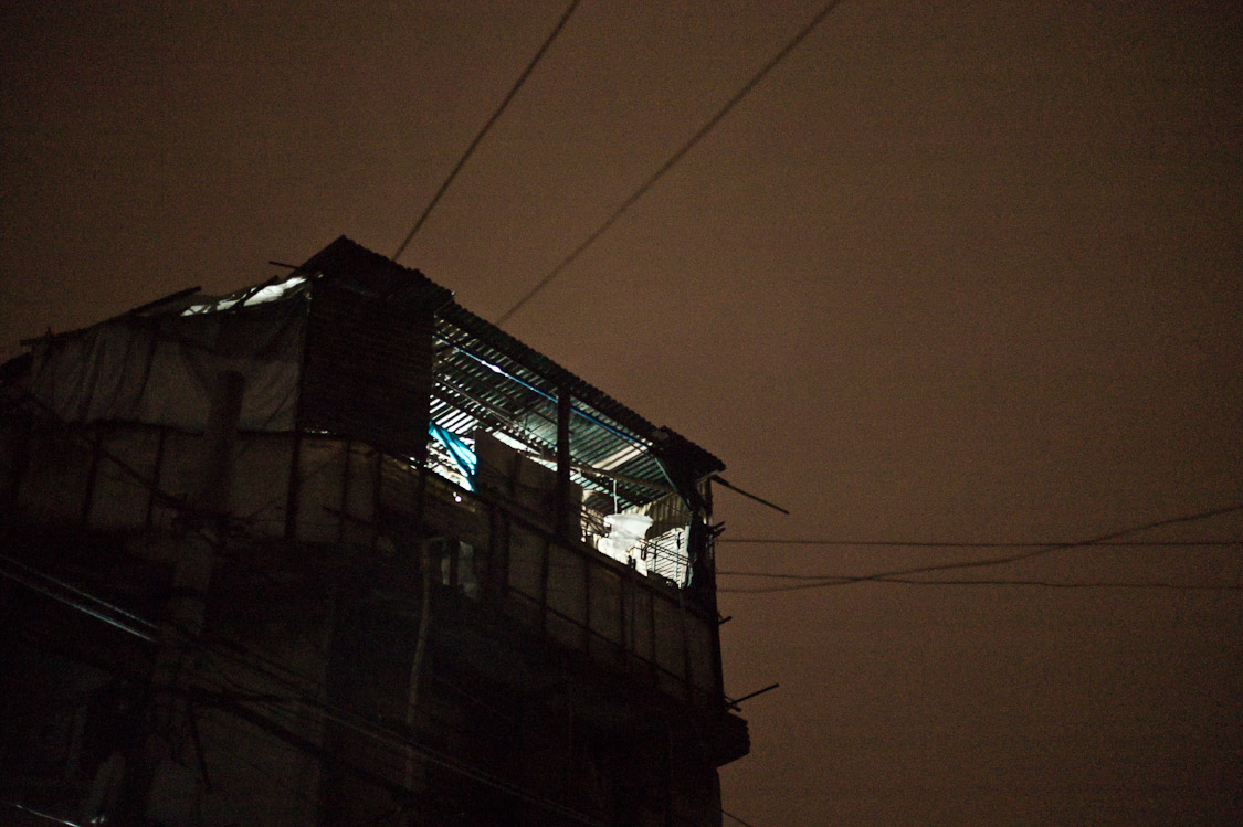 #35 rooftop living. the entire house below was stripped - bare walls remain